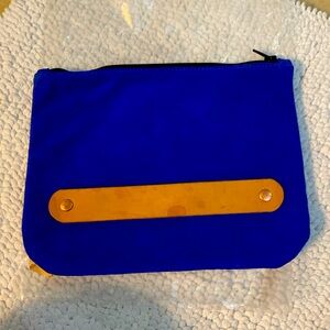 Handmade suede pouch with strap